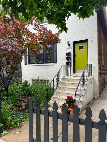 summertime flowers and view of the front house - 2446 W Thomas St