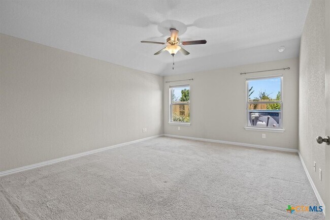 Building Photo - 5642 Meadow Sky