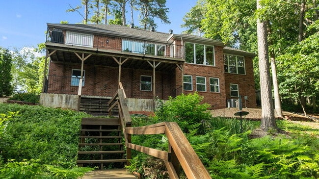 Building Photo - Serene Bella Vista Lakeside 4 bedroom