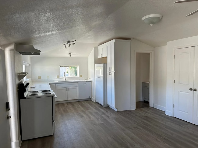 Building Photo - Welcome to this charming, newly remodeled rustic property offering privacy, comfort, and character.