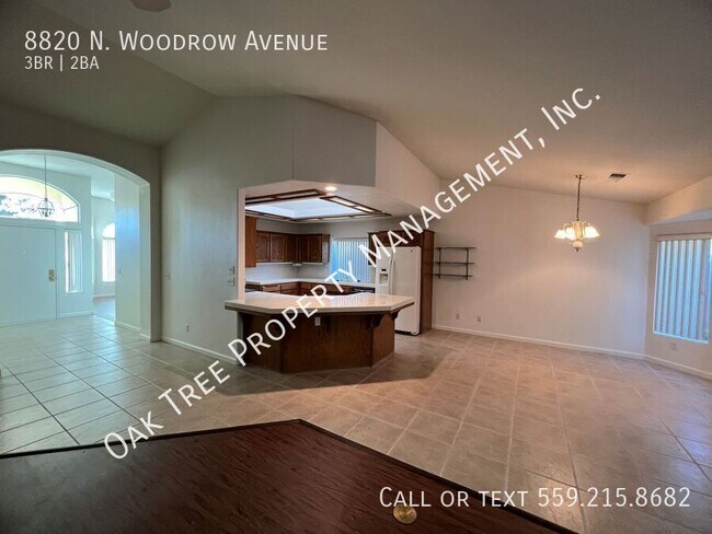 Building Photo - 8820 N Woodrow Ave