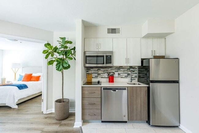 Building Photo - Move in Today @ The Spoke Peachtree Corners-Specials are Limited Time Only! 678-535-9535