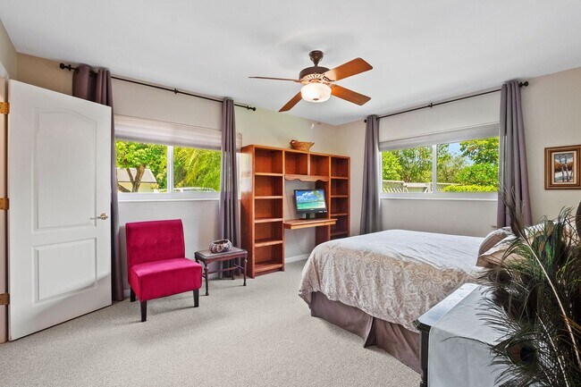 Building Photo - Stunning 4BR/3BA Pool Home with Outdoor Oa...