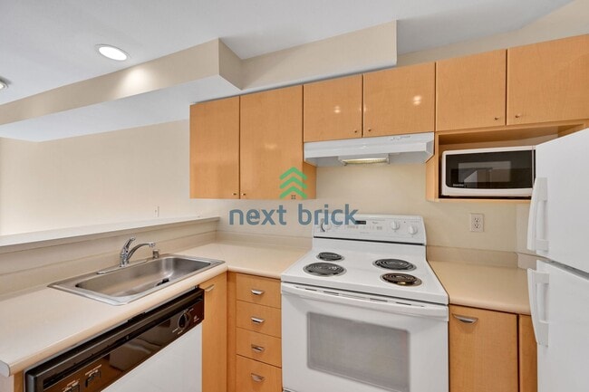 Building Photo - Modern Studio with Sleeping Alcove & Incre...