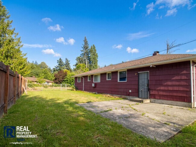 Building Photo - Charming Tacoma Home with Huge Fenced Yard, Garage & Hardwood Floors