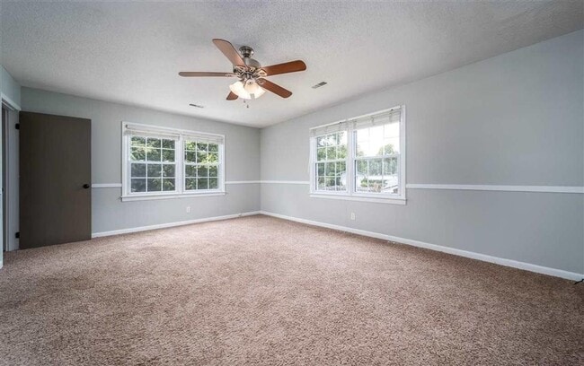 Building Photo - 4 bed & 2.5 bath with a pool