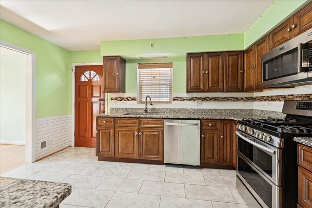 Building Photo - 3836 W Estes Ave