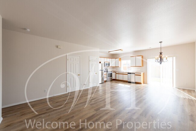 Building Photo - Enjoy the Open Floor Plan and Generous Storage in this College Place Duplex