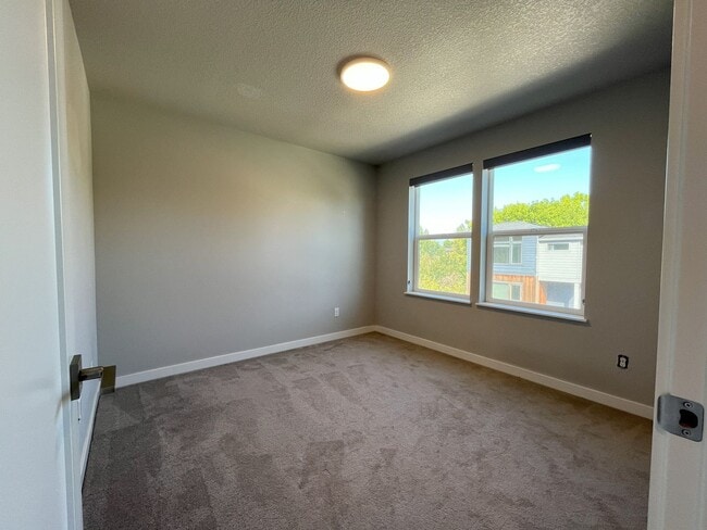 Building Photo - Three-Level Modern Living with Open Floor ...