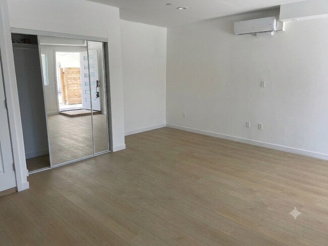 Building Photo - Brand New Thai Town Studio w/ All Utilities Included!
