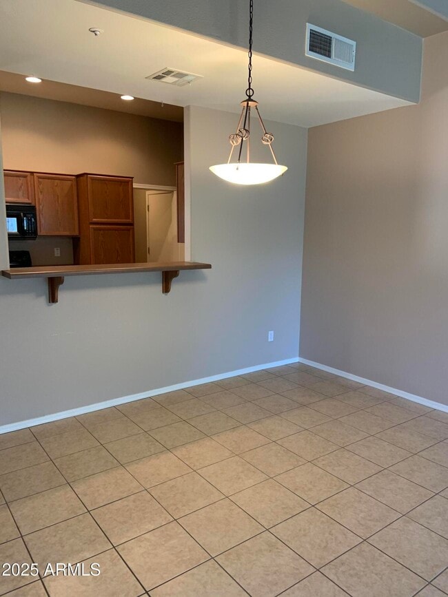 Building Photo - 7977 W Carolina Dr