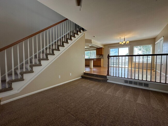 Building Photo - Large 2-story home with 3 bedrooms up plus loft!  Finished basement!