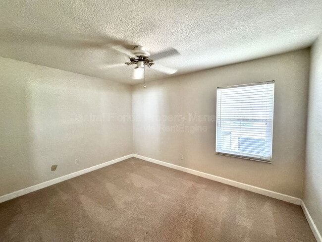 Building Photo - 4818 Breezy Palms Ct