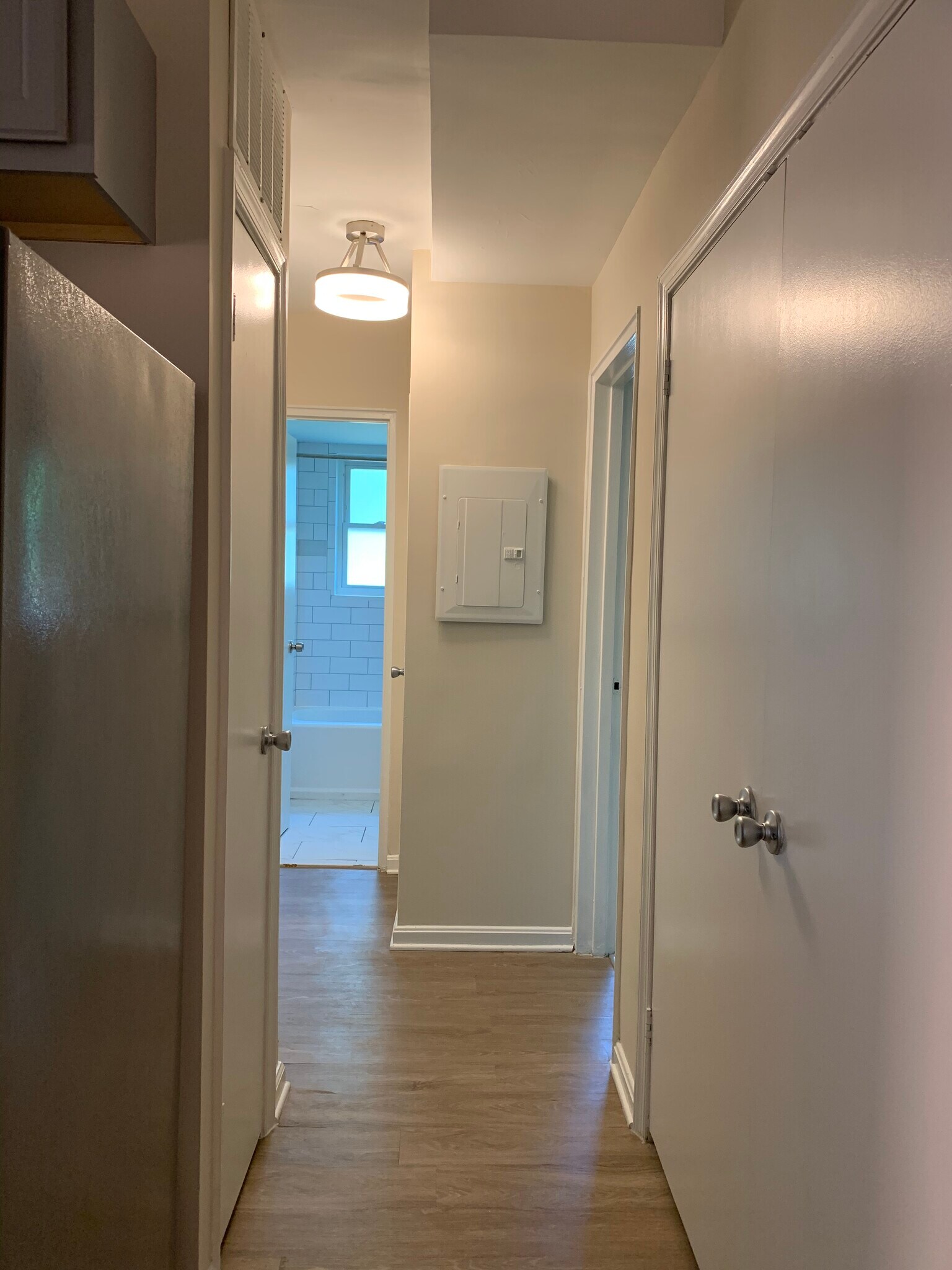 Hallway from Kitchen to Bedrooms. Bedroom 2 is on the right. - 526 Kenyon Street NW #101