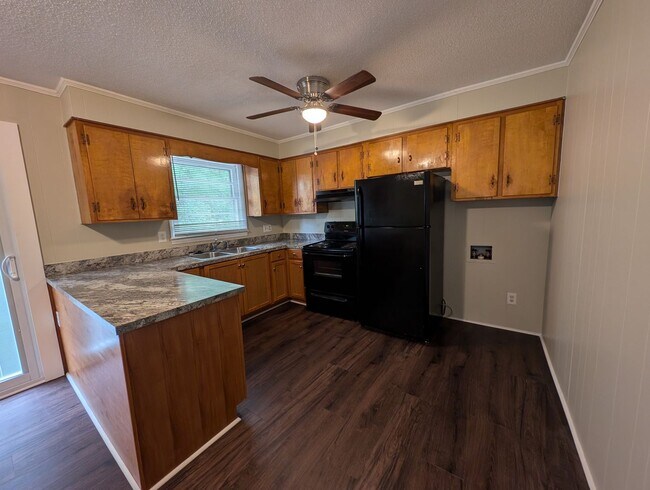 Building Photo - **Price Reduced with Lawncare included!