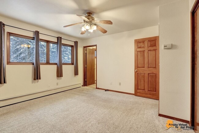 Building Photo - Spacious Home with Garage & Fenced Yard Near JBER & Major Hospitals