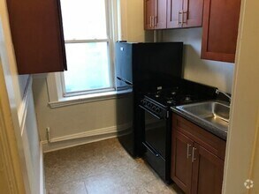 Building Photo - Large updated 2 bed unit with the landlord...