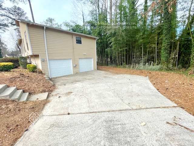 Building Photo - 6712 Songwood Dr