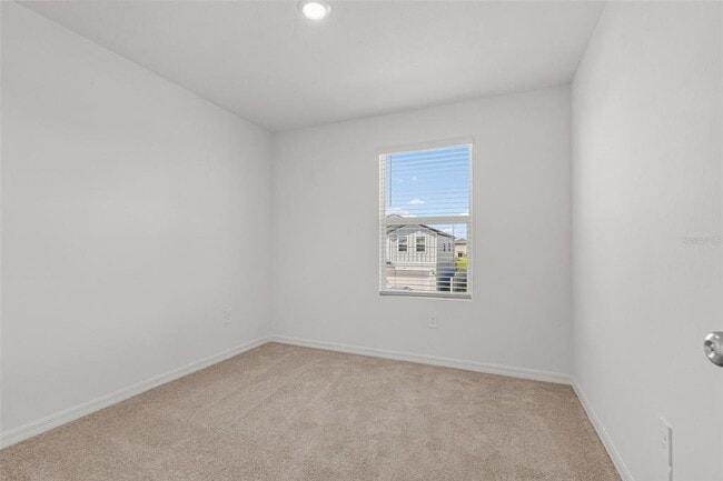 Building Photo - 5767 Purple Finch Ave