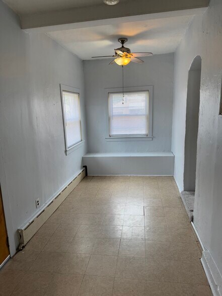 Eat in kitchen with build in storage and new window treatments thru out unit. - 2346 122nd St