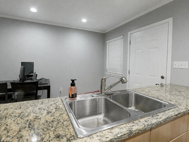 Building Photo - Updated North Austin Townhome with Exceptional Outdoor Space
