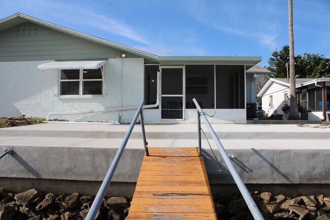 Building Photo - For Rent – 3-Bed / 2.5-Bath Deep Water Canal, Canal-Front Home with a Floating Dock,  totally ren...