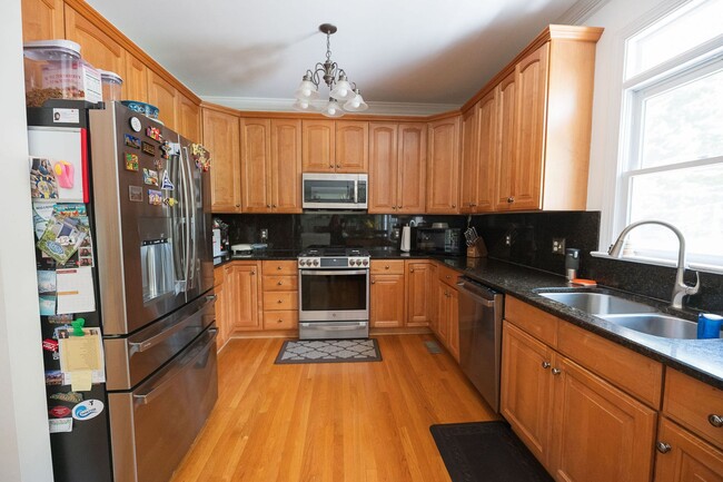 Building Photo - Spacious & Striking 3-story brick Executive 4 bedroom 4.5 bathroom home in Oak Ridge NC + Lawn ca...