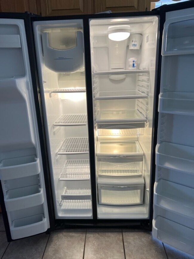 Building Photo - Beautiful home on a large corner lot with RV parking