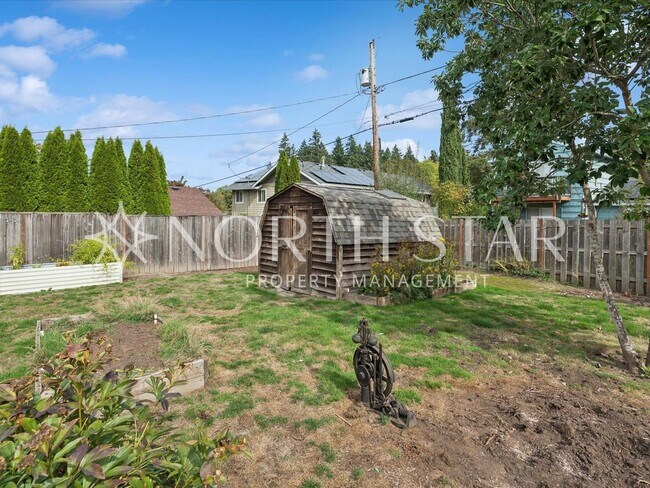 Building Photo - Charming Updated One-Level Home with Spaci...