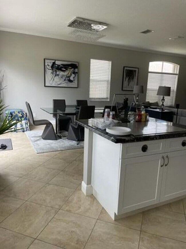 Building Photo - 7891 Manor Forest Blvd