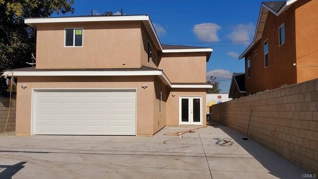 2 car garage plus onsite parking - 3510 W 5th St