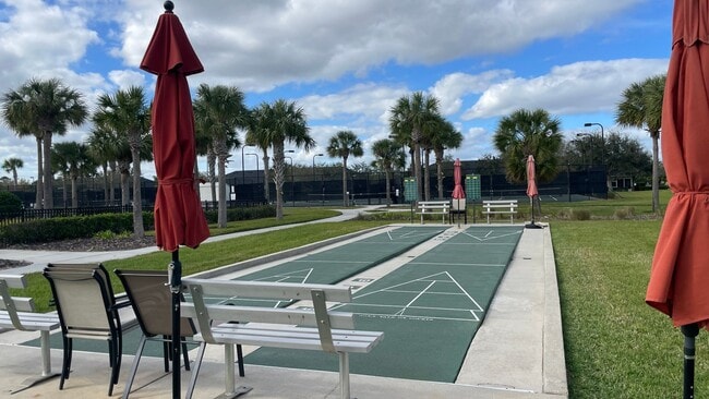 Building Photo - Elevated Luxury at The Terraces – 4th Floor Lake & Golf Course Views! 55+ Community!