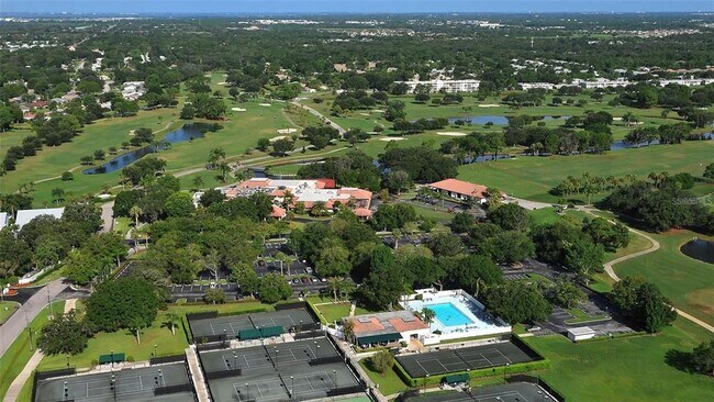 Building Photo - 7880 Palm Aire Ln