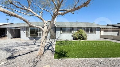 Building Photo - 8608 E Vernon Ave