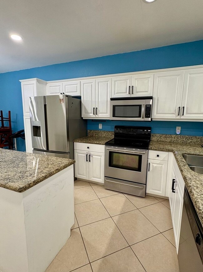 Building Photo - Cozy 3/2.5 Townhome in Convenient Location