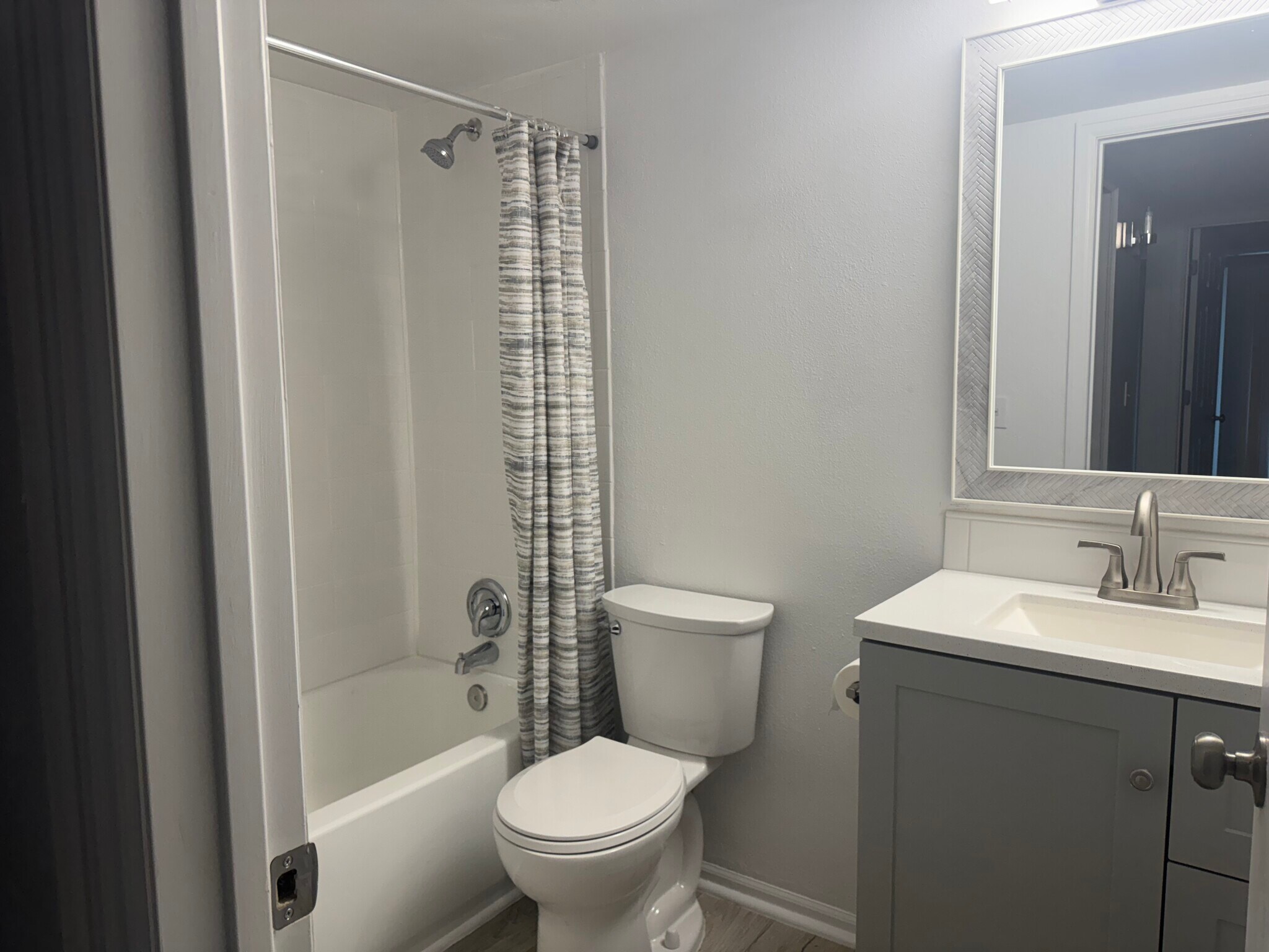 New from top to bottom, including new tub shower combo, new sink, toilet, cabinet, and fan - 2575 S Syracuse Way