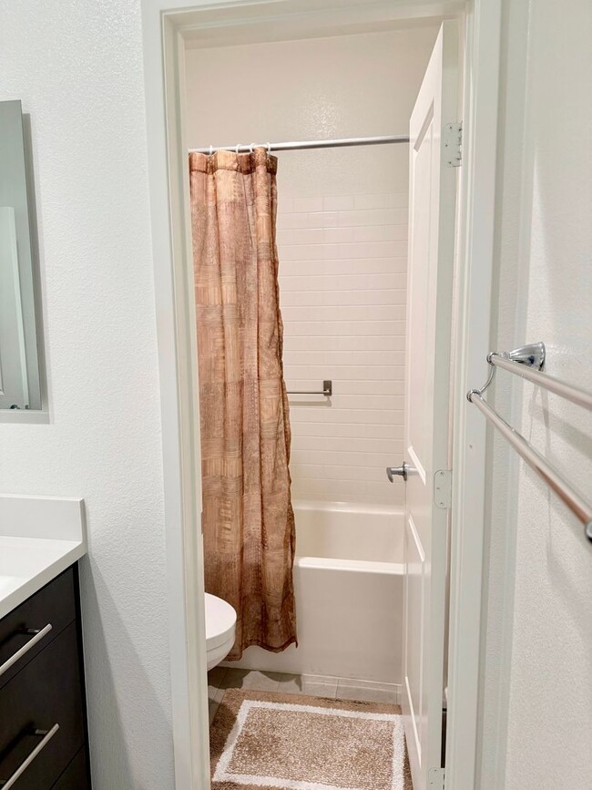 Building Photo - Stunning 3-Bed/2.5-Bath End Unit Condo with Solar & Large Yard