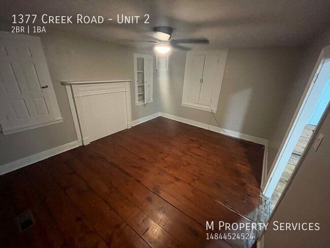 Building Photo - Cozy Two Bedroom Apartment Available near ...