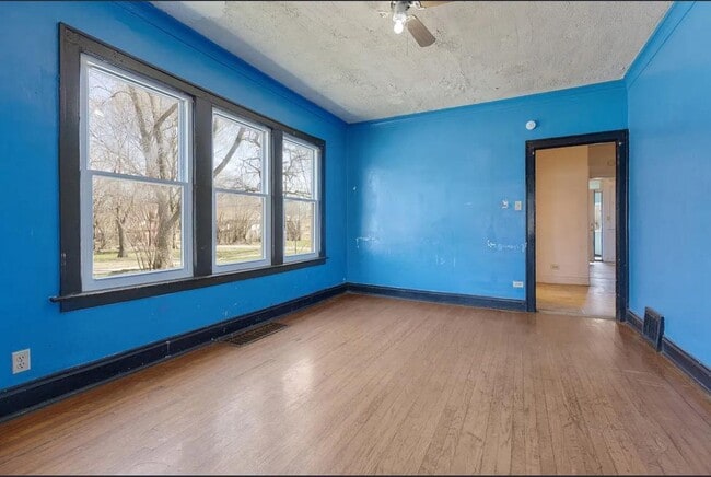 Building Photo - 1301 W 71st Pl