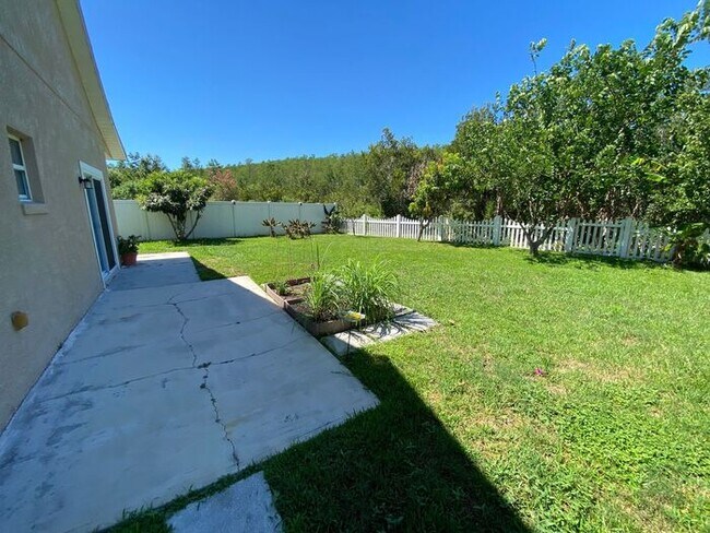 Building Photo - 4/3 Kissimmee Home with Guest-Suite