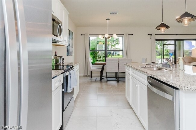 Building Photo - 6168 Harmony Dr