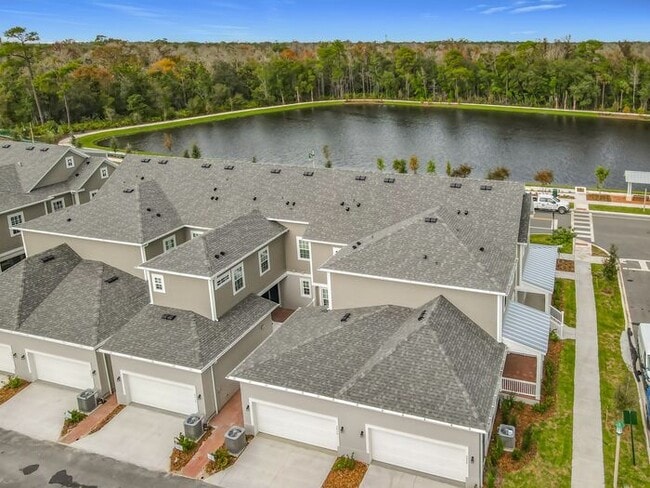 Building Photo - Brand New Luxury Town House in Island Village a Celebration, FL maintenance free community.