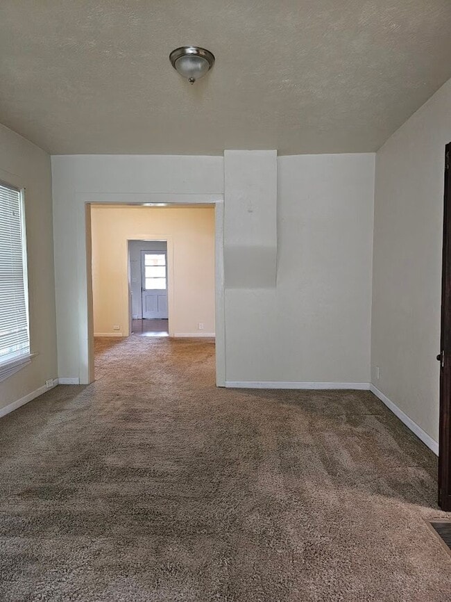 Building Photo - Two Bedroom One Bath Lower Duplex with W/D Hookup