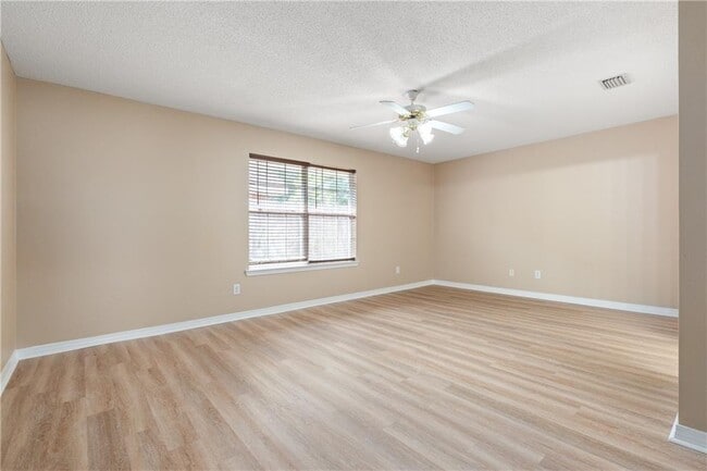 Building Photo - 8158 Magnolia Village Dr N