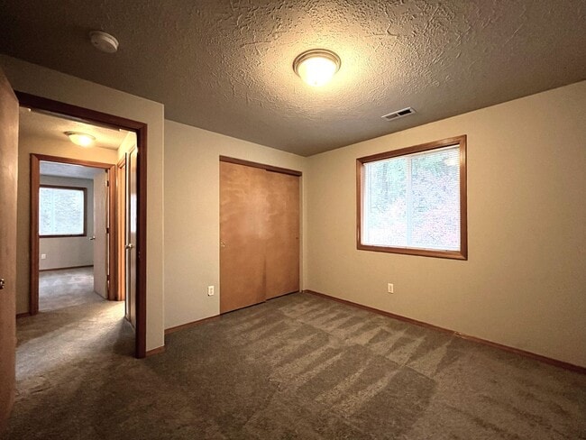 Building Photo - 3-Bed Home with Fireplace, Fenced Backyard, 2 Car Garage & Front Patio!