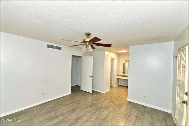 Building Photo - 9125 W H Burges Dr