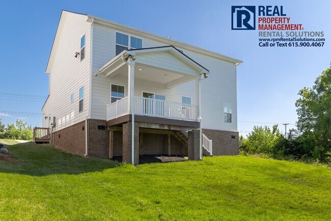 Building Photo - Great 4 bd 2.5 ba with attached garage and large deck!