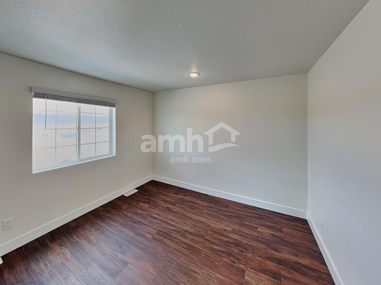 Building Photo - 7123 Woods Rose Dr