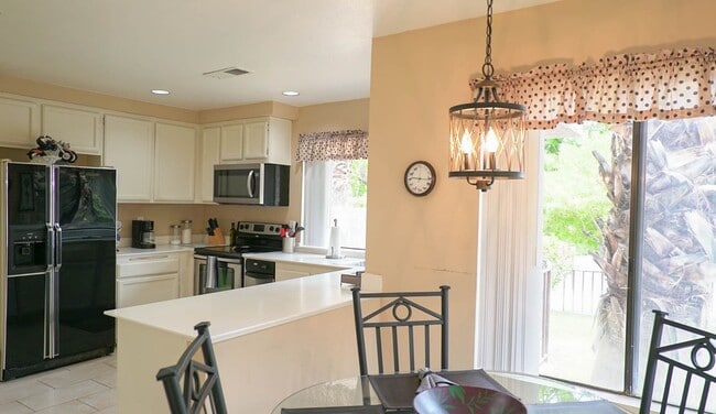 Building Photo - Beautifully Furnished Condo with Mountain ...