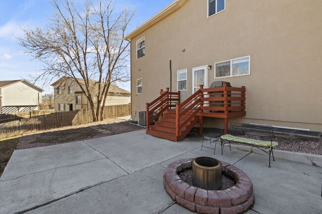Building Photo - Spacious Home with Finished Basement, Granite Kitchen & Fenced Yard Near Fort Carson